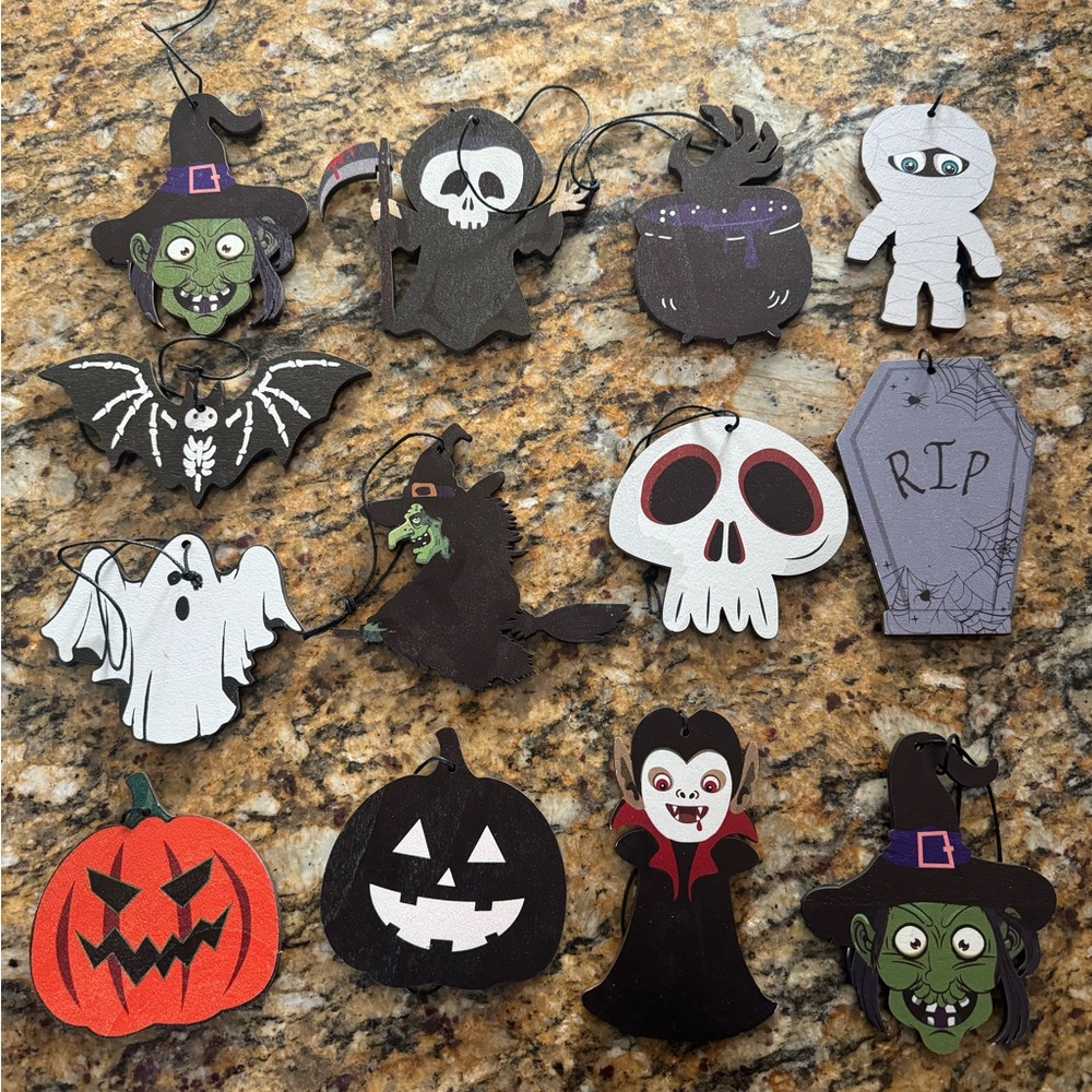 Mixture Of Halloween Decorations With String To Hang